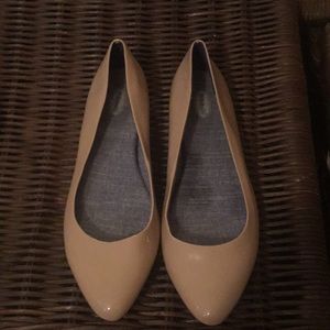 Tan pointed-toe flats